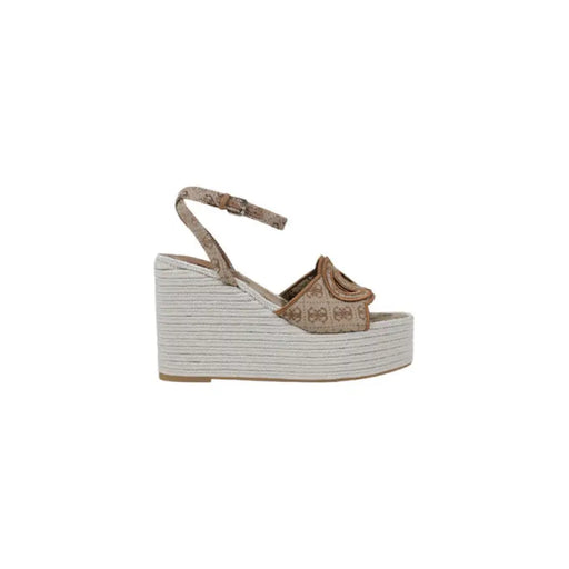 Beige patterned wedge sandal with stylish design and comfortable heel for women