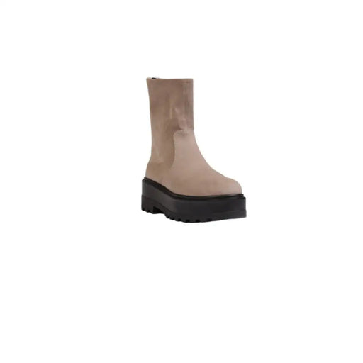 Beige suede platform ankle boot displayed on product page