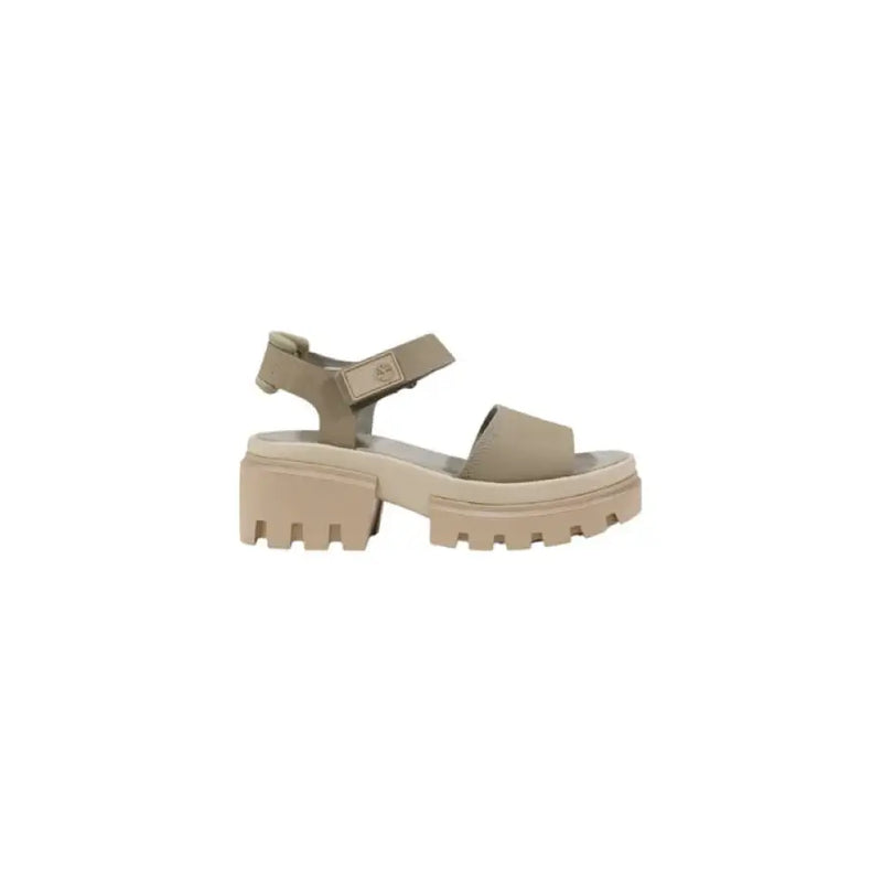 Elegant beige platform sandal displayed on a product showcase