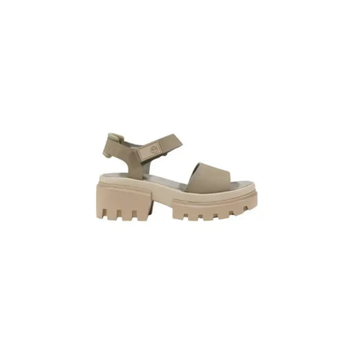 Elegant beige platform sandal displayed on a product showcase