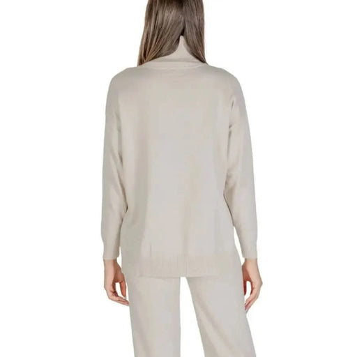 Beige turtleneck sweater and pants set from Clerè Women’s Knitwear for Fall/Winter