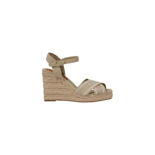 Beige wedge sandal with ankle strap displayed in the product titled Beige Wedge Sandal with Ankle Strap