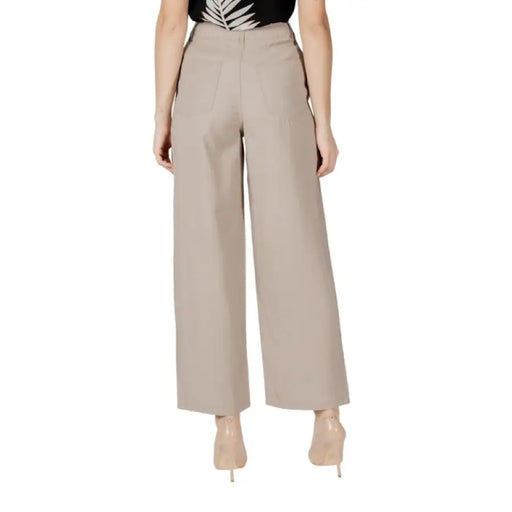 Beige wide-leg pants showcasing a stylish and comfortable fit for versatile outfits