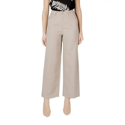 Beige wide-leg pants displayed elegantly as a stylish fashion product