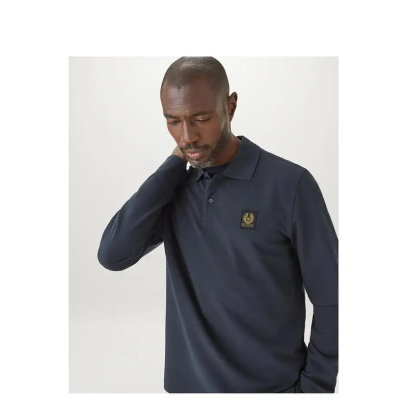 Polo Belstaff bleu marine à manches longues en coton pour homme, avec logo brodé doré sur la poitrine.