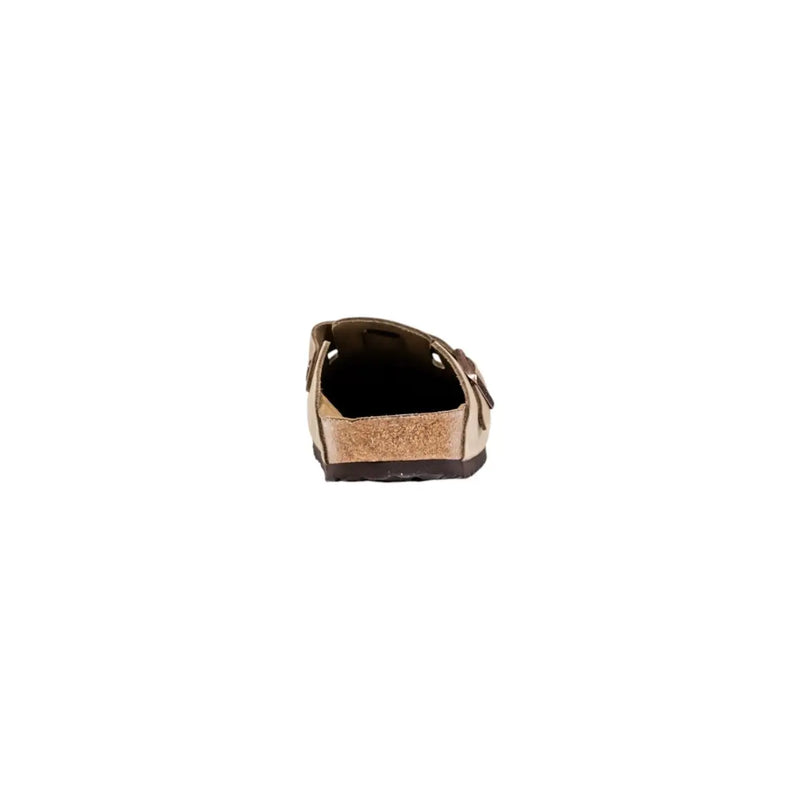 Sabots Birkenstock pour homme en cuir beige avec semelle intérieure en liège et semelle extérieure en caoutchouc marron foncé pour un confort optimal.