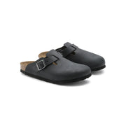 Birkenstock women black leather boston sandals featuring black leather clogs with silver buckle and cork footbed