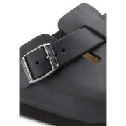 Birkenstock women black leather boston clog with silver-toned buckle showcasing premium material and design