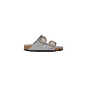 Light gray Birkenstock womens leather slippers with gold buckles and cork footbed
