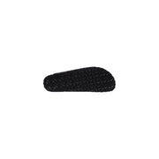 Black rubber sole with textured patterned tread design on the back side of birkenstock women leather sandals black arizona