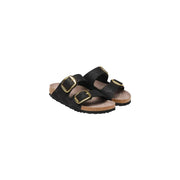 Birkenstock women sandals in black faux leather with gold-tone buckles and cork footbed for comfortable wear