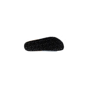 Black rubber sole with textured wavy pattern on the back of birkenstock women slippers light blue polyester