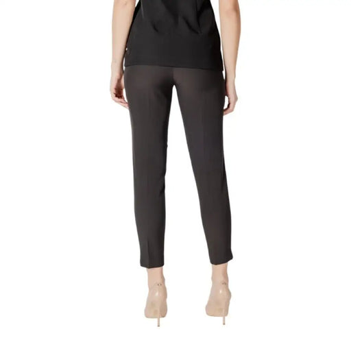 Black Slim Fit Trousers displayed on a clean white background highlighting the fabric