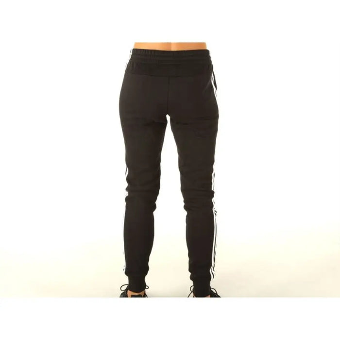 Black Adidas Sweatpants with white stripes for athletic wear and active lifestyle
