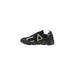Black and beige athletic shoe featuring geometric accents for sporty style