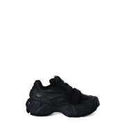 Black chunky Velcro athletic sneakers displayed in a modern sports shoe shop