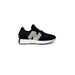 Black New Balance women sneakers with white speckled N logo, white midsole, and rubber soles