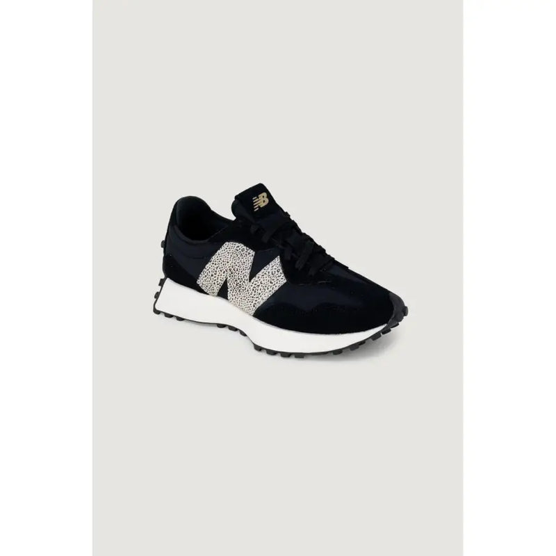 Black New Balance women sneakers with white spotted N logo and white rubber soles