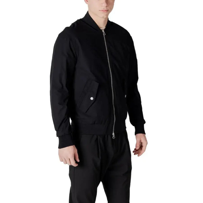 Black Bomber Jacket showcasing a sleek design and modern style for versatile wear