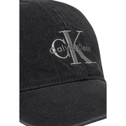 Black Calvin Klein baseball cap displayed with versatile casual style and branding