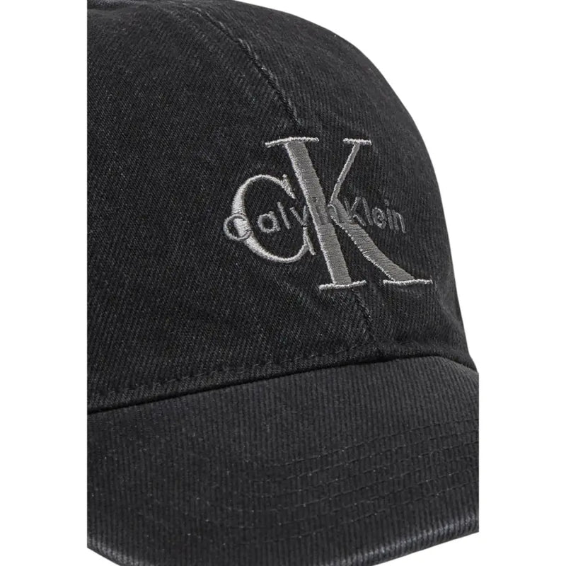 Black Calvin Klein baseball cap displayed with versatile casual style and branding