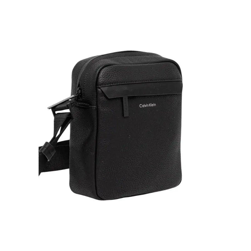Black Calvin Klein crossbody bag with sleek design and adjustable strap