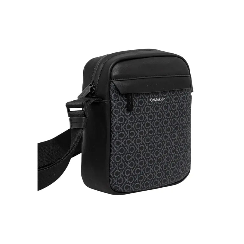 Black Calvin Klein crossbody bag displayed in a product listing image