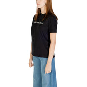 Black Calvin Klein Jeans women’s short sleeve cotton T shirt displayed for sale