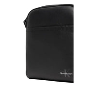 Black Calvin Klein shoulder bag displayed in the Calvin Klein Black Shoulder Messenger Crossbody Bag