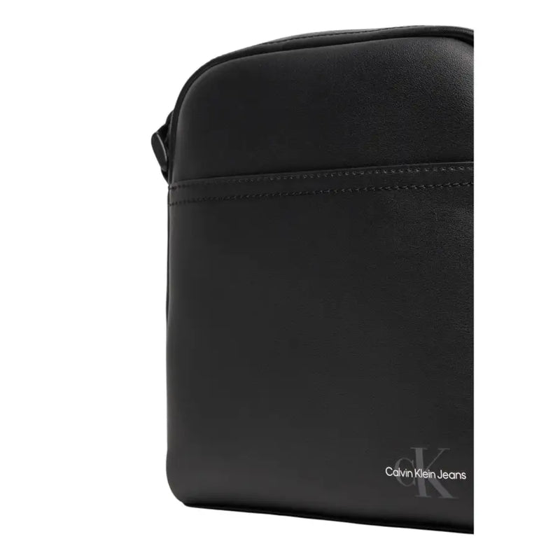 Black Calvin Klein shoulder bag displayed in the Calvin Klein Black Shoulder Messenger Crossbody Bag
