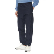 Pantalon de survêtement noir Calvin Klein avec ourlets élastiques et bas de pantalon de jogging bleu marine foncé orné d'un logo blanc discret sur la jambe gauche