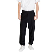 Black Calvin Klein slim-fit jogger pants with elastic cuffs and relaxed silhouette in soft fabric