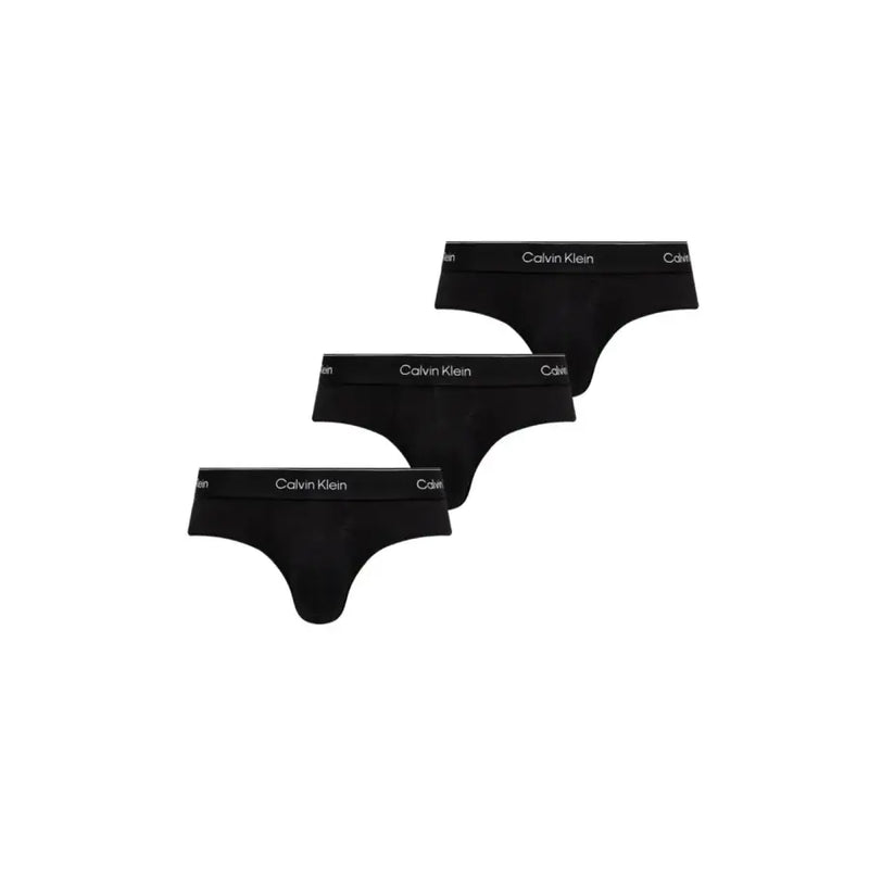 Black Calvin Klein thong underwear in black with white logo trim showcasing front design in the thong and brief collection