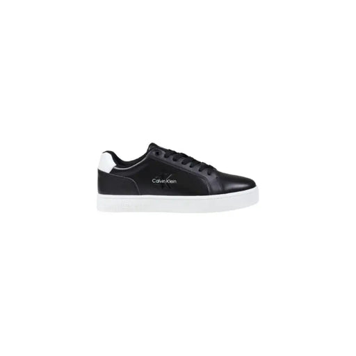 Black Calvin Klein sneaker with white leather and black heel accent for stylish footwear