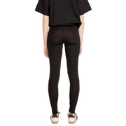 Black cotton leggings for women by Jacqueline De Yong with high waist smooth form-fitting material and subtle seam detailing