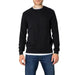 Black crew neck sweater over white undershirt from Armani Exchange Men Knitwear