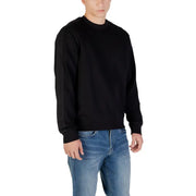Black crewneck sweater made of soft fabric featuring long sleeves and ribbed cuffs for a comfortable fit