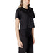 Black cropped T shirt displayed with jeans in product image