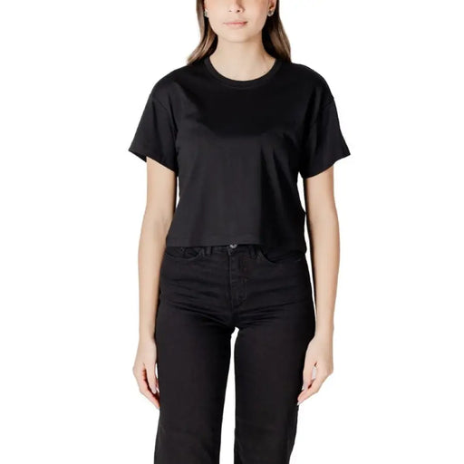 Black cropped T shirt and jeans displayed in the product Black Cropped T Shirt and Jeans