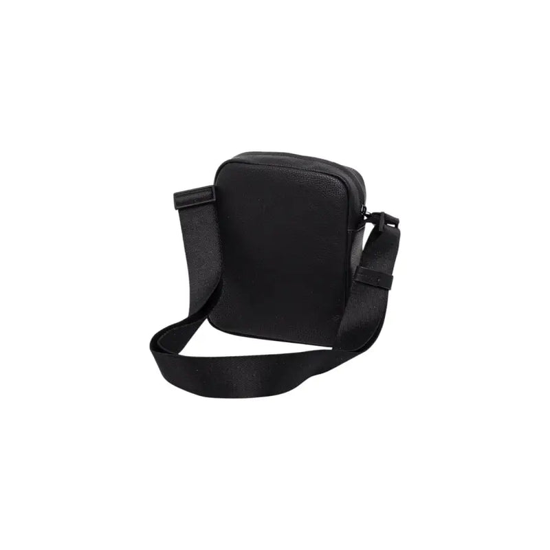Black Calvin Klein crossbody bag displayed on a plain background