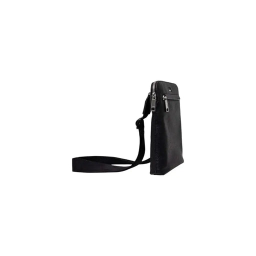 Black leather crossbody bag with multiple zippers for a stylish and practical accessory