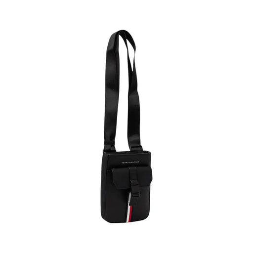 Black Tommy Hilfiger shoulder crossbody bag with front pocket for stylish convenience