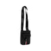 Black Tommy Hilfiger shoulder crossbody bag with front pocket for stylish convenience