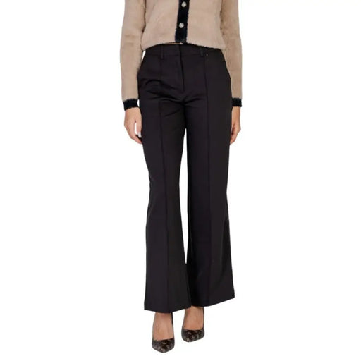 Black flared trousers showcasing a stylish and modern design for women’s fashion