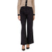 Black flared trousers showcasing a stylish and modern design for women’s fashion
