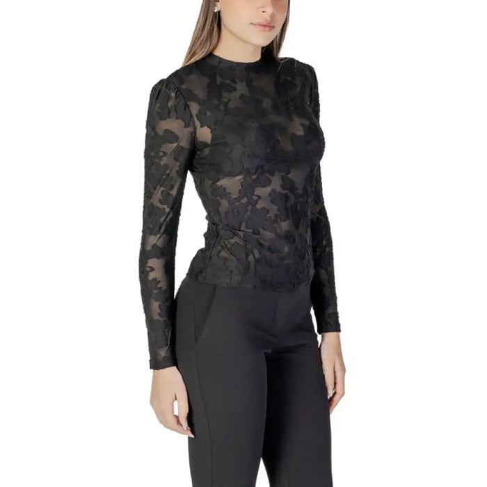Elegant black floral lace long-sleeve top, perfect for stylish evening wear