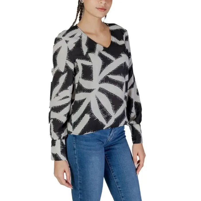 Black and gray patterned sweater with abstract leaf designs from Jacqueline De Yong
