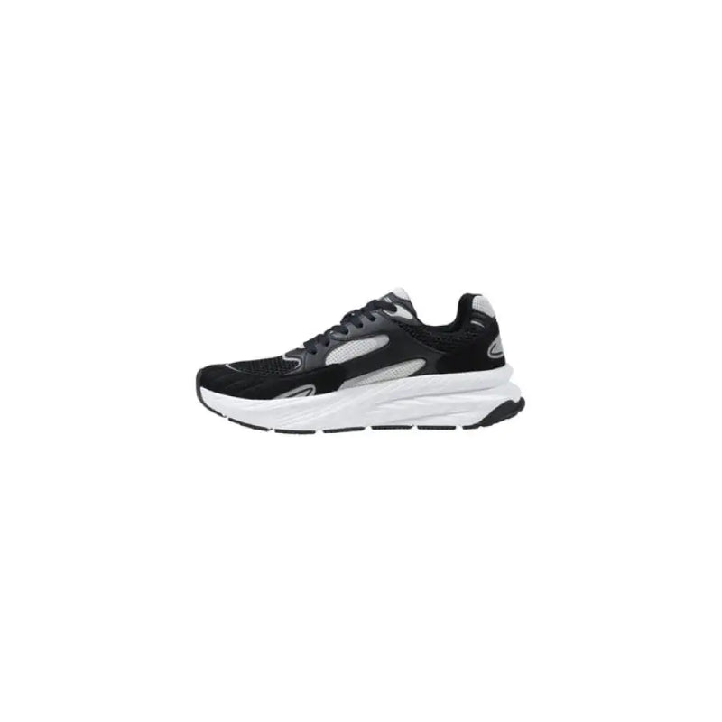 Black, white, and gray running shoe displayed for athletic footwear product