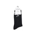 Black Guess socks featuring pink ribbing with maroon and red stripes