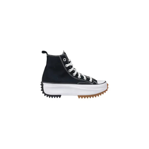 Black high-top platform sneaker showcasing a stylish and modern footwear design